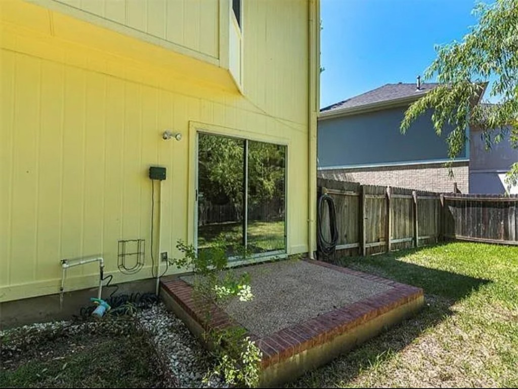 16303 Ascent Cove Pflugerville, TX 78660 - Photo 12 of 37 a view of a backyard with plants