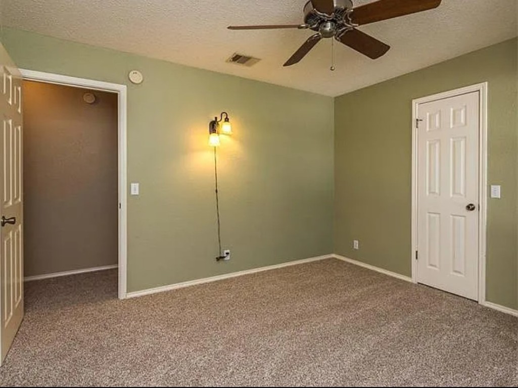 16303 Ascent Cove Pflugerville, TX 78660 - Photo 22 of 37 a view of an empty room with a window