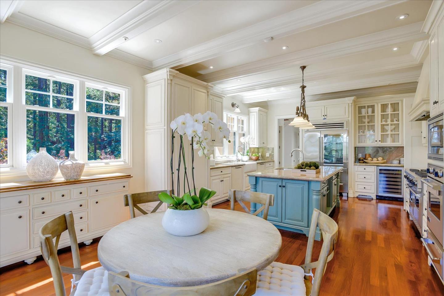 700 Patrol Road Woodside, CA 94062 - Photo 12 of 55 a dining room with furniture window and wooden floor