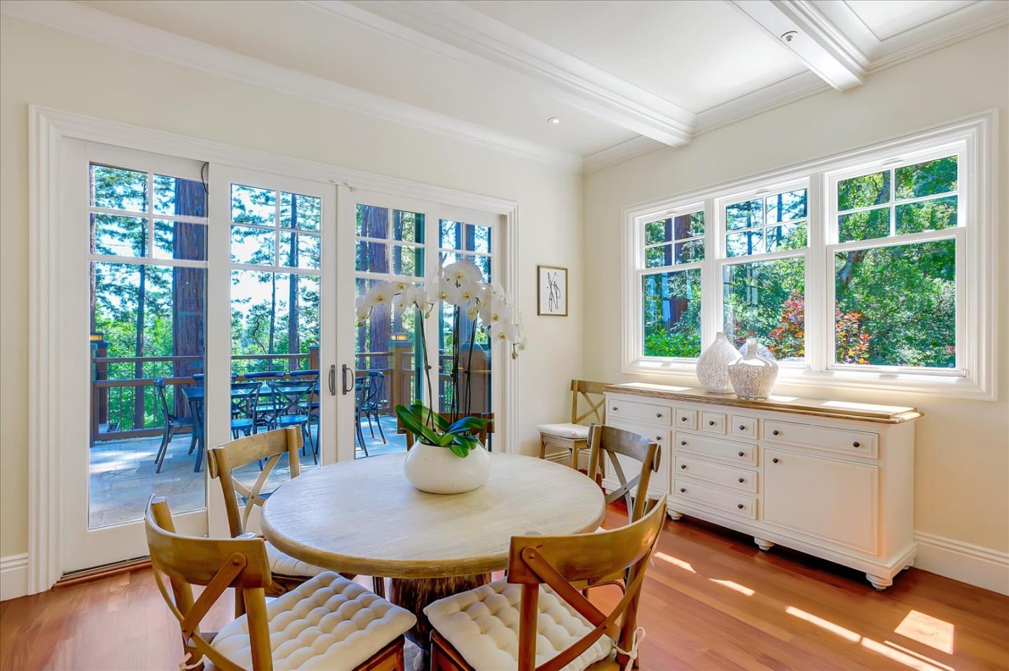 700 Patrol Road Woodside, CA 94062 - Photo 13 of 55 a view of a dining room with furniture window and wooden floor