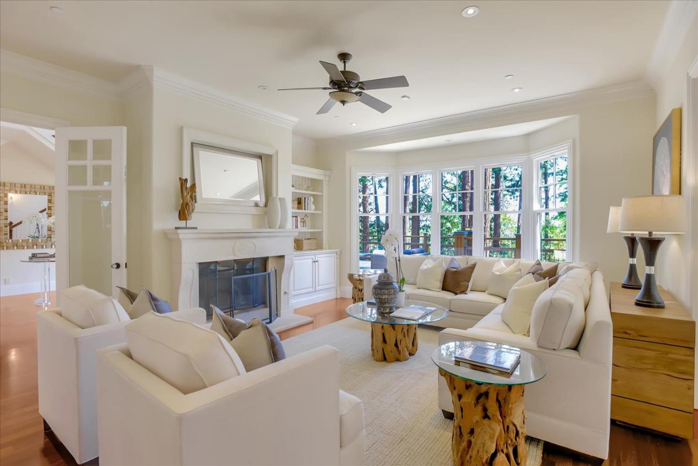 700 Patrol Road Woodside, CA 94062 - Photo 16 of 55 a living room with furniture and a fireplace