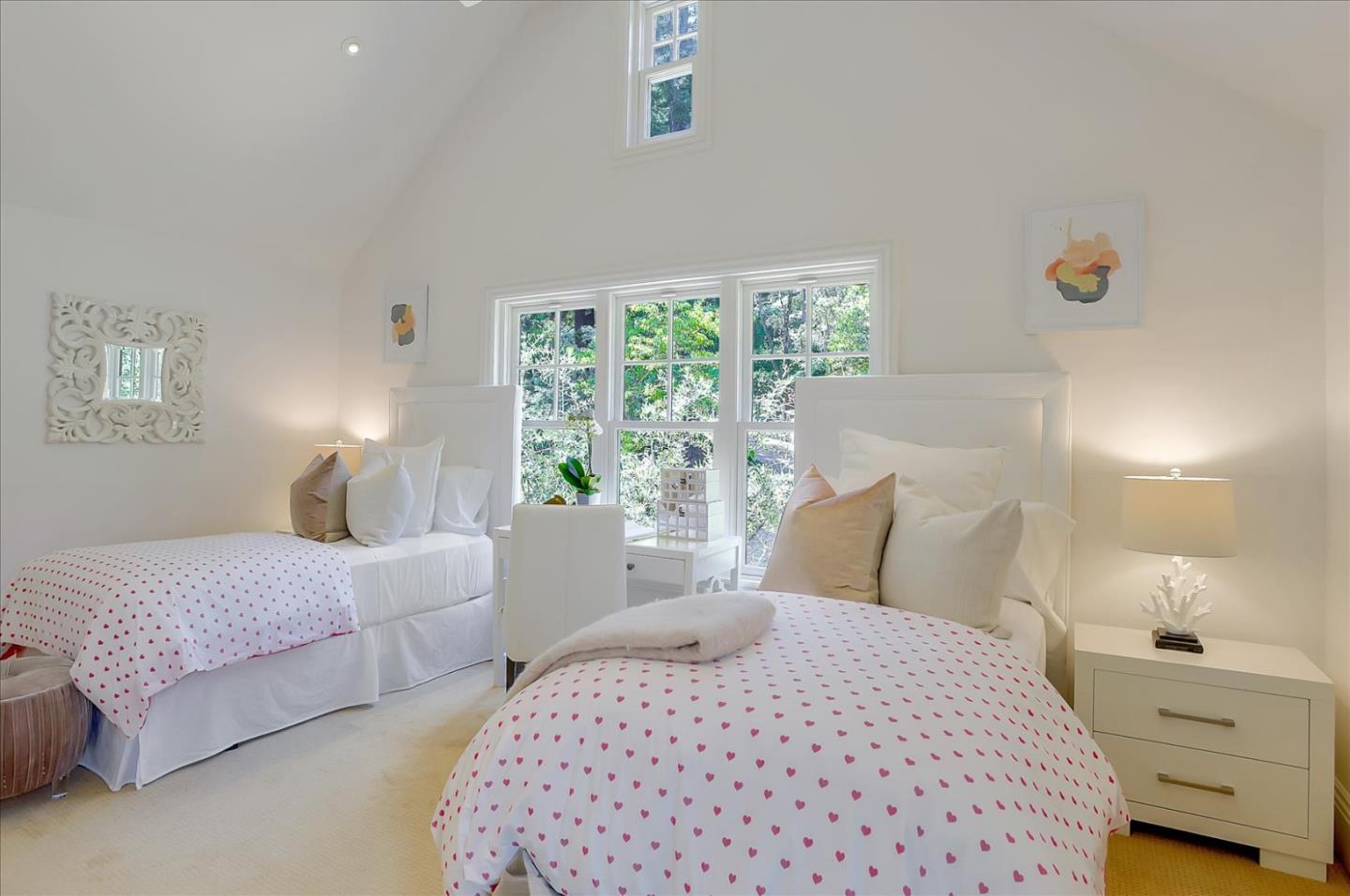 700 Patrol Road Woodside, CA 94062 - Photo 31 of 55 a bedroom with a bed and a lamp