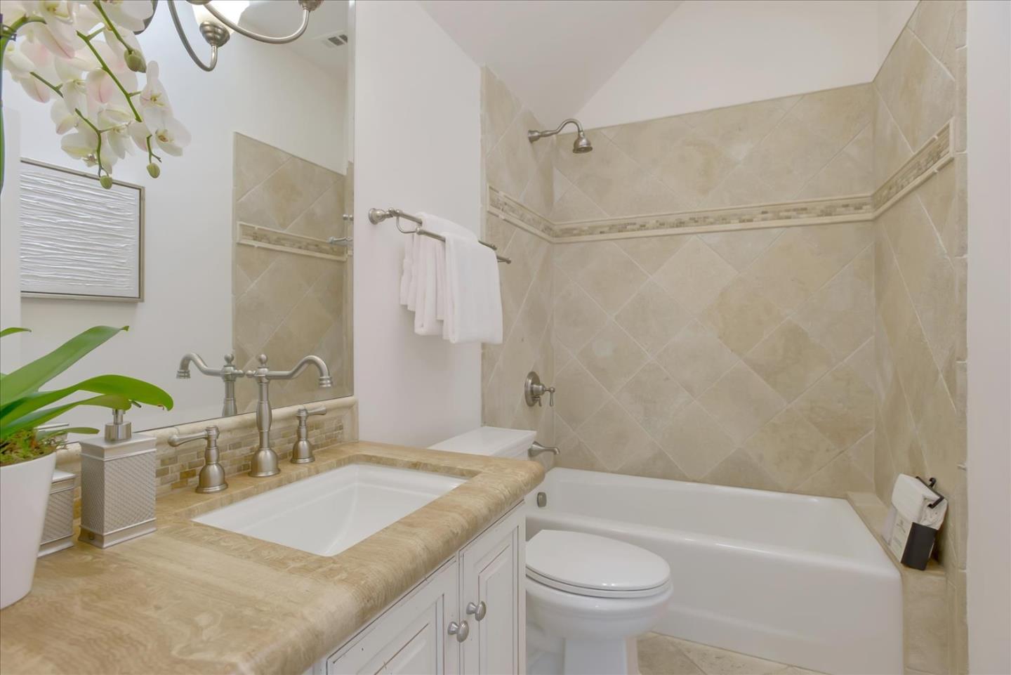 700 Patrol Road Woodside, CA 94062 - Photo 32 of 55 a bathroom with a granite countertop sink a toilet and shower