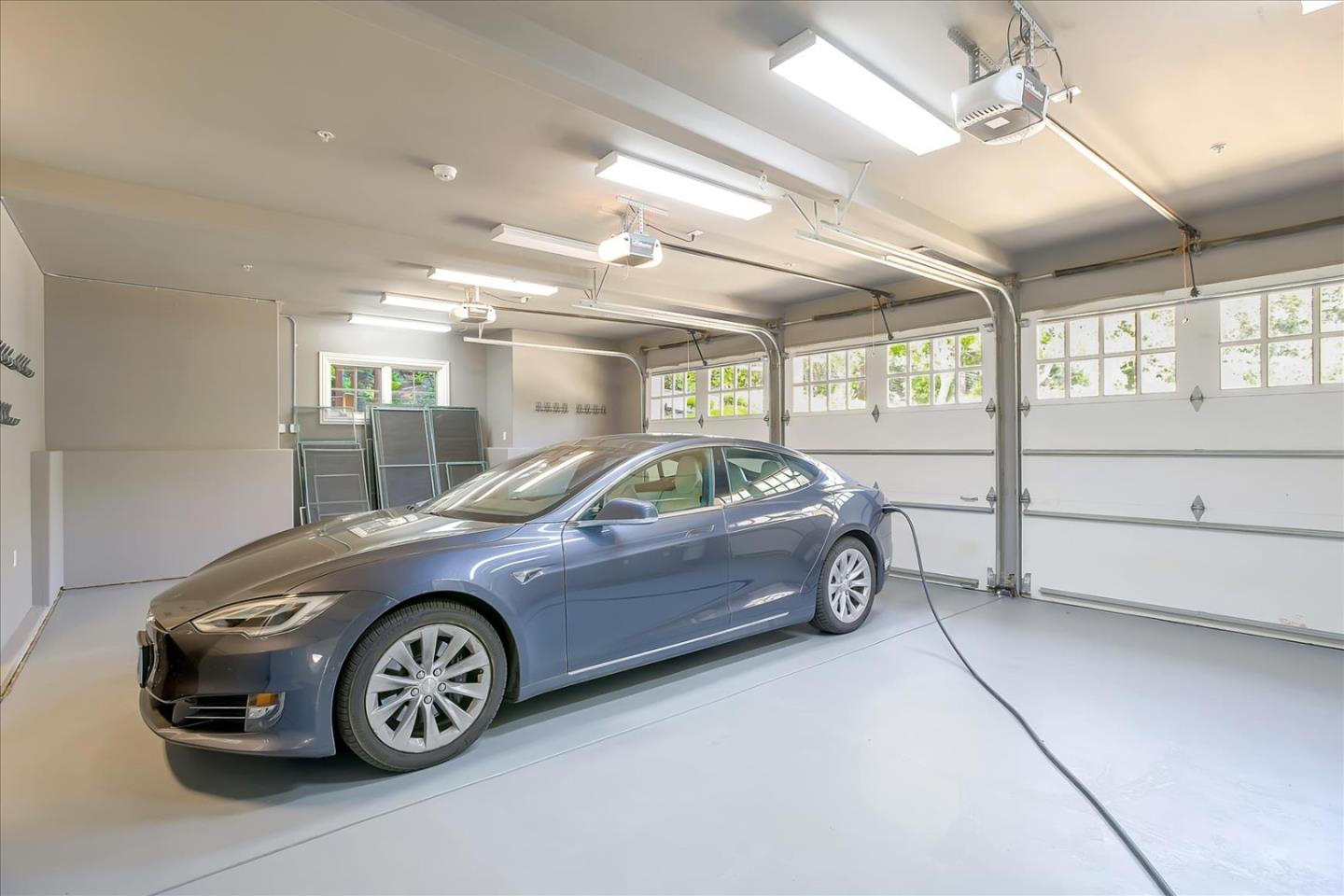 700 Patrol Road Woodside, CA 94062 - Photo 39 of 55 a car parked in a garage