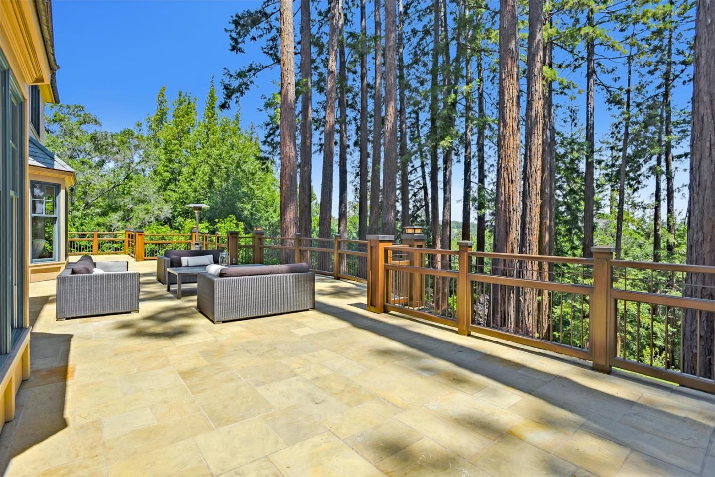 700 Patrol Road Woodside, CA 94062 - Photo 42 of 55 a view of a swimming pool with a patio