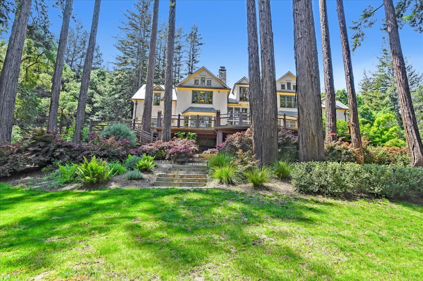 700 Patrol Road Woodside, CA 94062 - Photo 50 of 55 a front view of a house with a yard