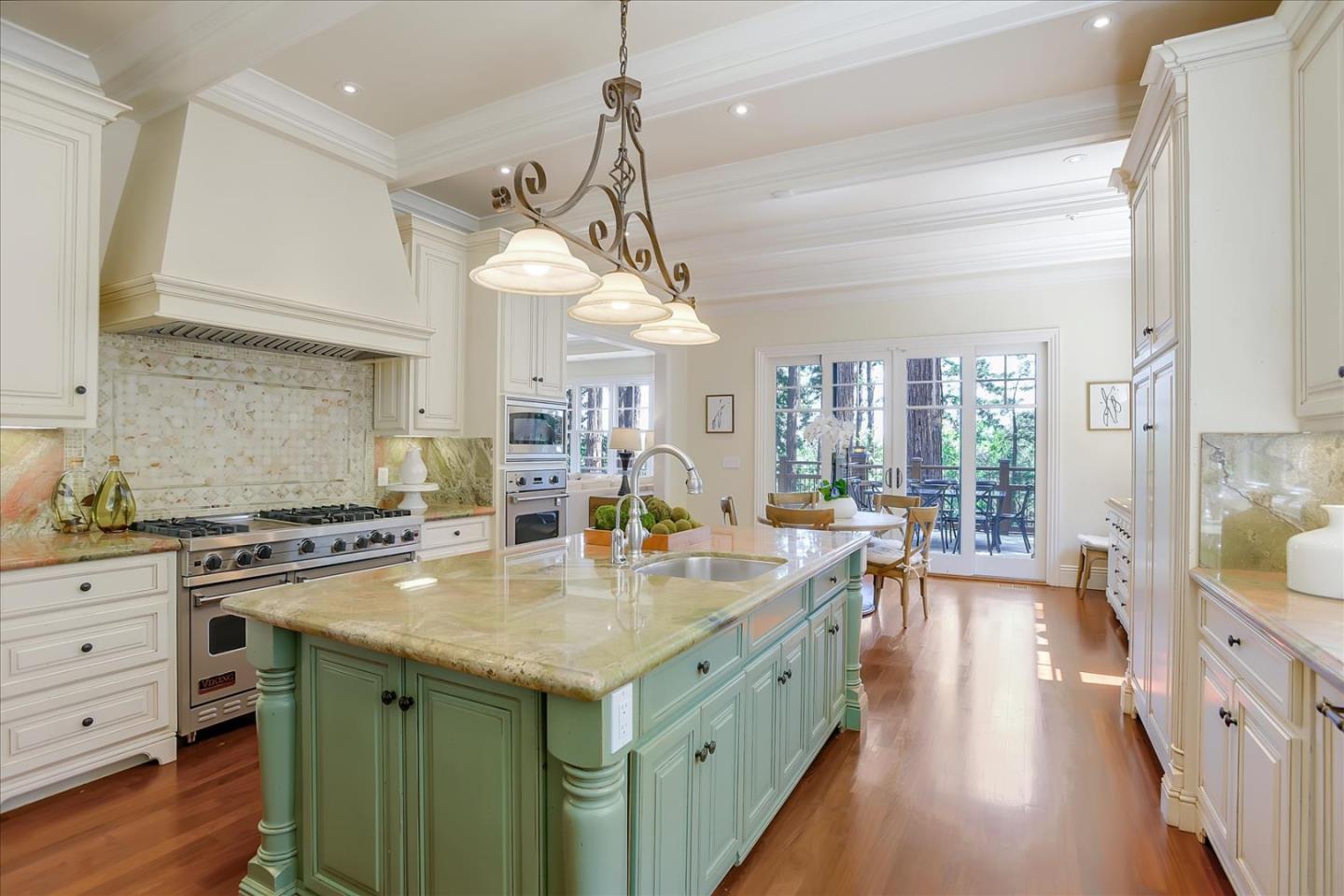 700 Patrol Road Woodside, CA 94062 - Photo 8 of 55 a open kitchen with stainless steel appliances granite countertop a lot of counter space and wooden floors