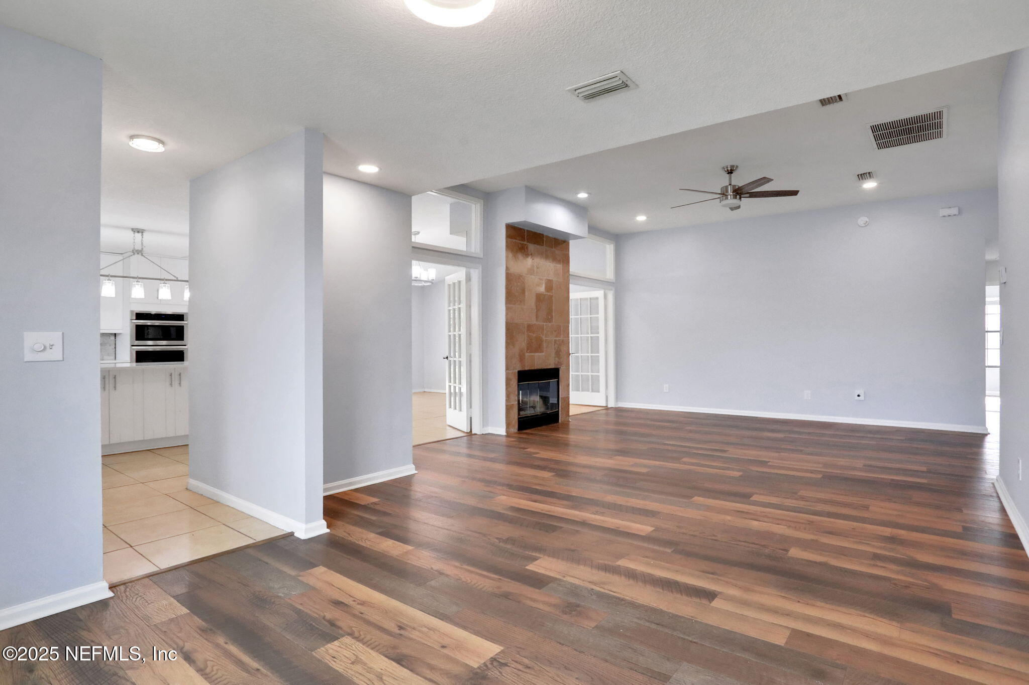 12228 Smoke Ridge Circle South Jacksonville, FL 32225 - Photo 25 of 50 a view of a hallway with wooden floor