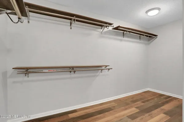 a view of a room with racks on the wall