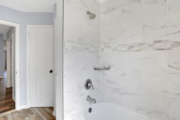a bathroom with a bathtub