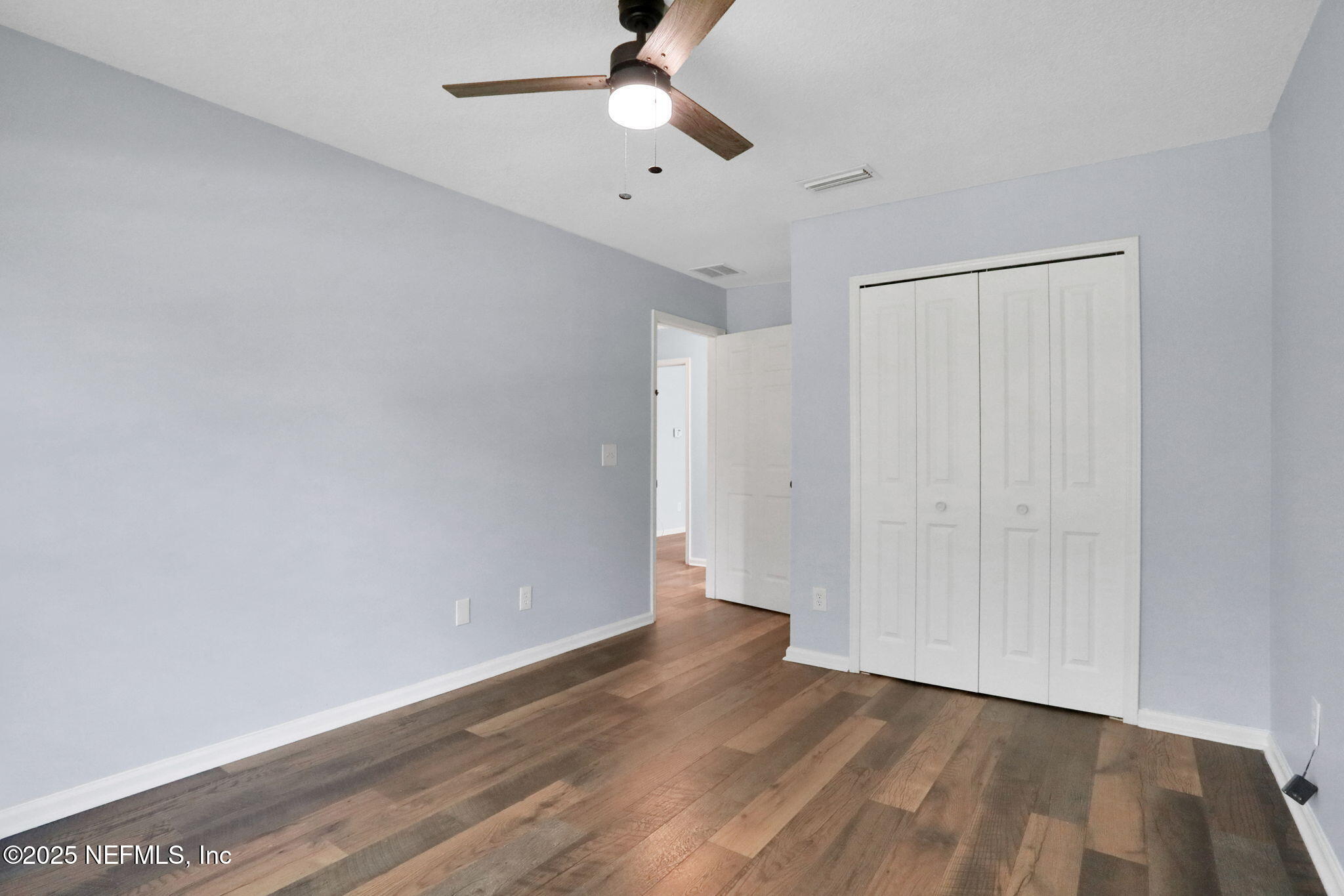 12228 Smoke Ridge Circle South Jacksonville, FL 32225 - Photo 42 of 50 wooden floor in an empty room