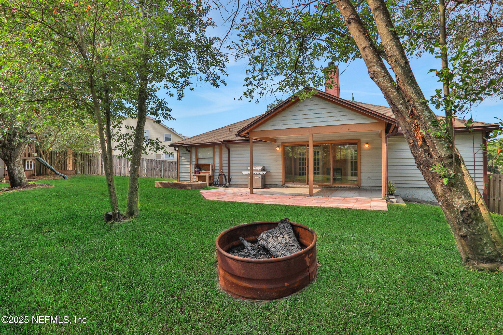 12228 Smoke Ridge Circle South Jacksonville, FL 32225 - Photo 47 of 50 a front view of a house with a yard