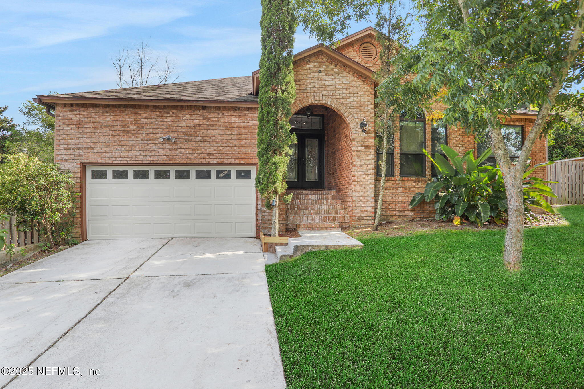 12228 Smoke Ridge Circle South Jacksonville, FL 32225 - Photo 50 of 50 a front view of a house with a yard