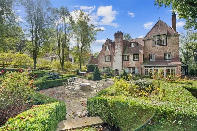 a view of outdoor space with deck and yard
