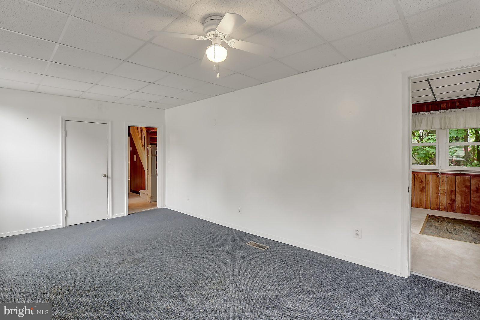 6406 Sherwood Road Baltimore, MD 21239 - Photo 14 of 25 a view of an empty room with a window