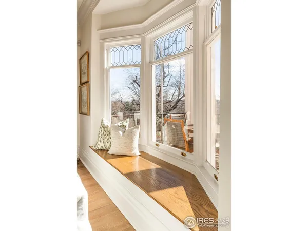 a view of a living room with a large window