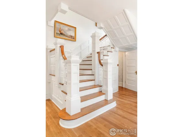 a view of a hallway with white walls