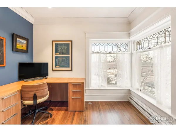 a room with a table and a window