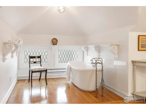 a view of livingroom with furniture and wooden floor
