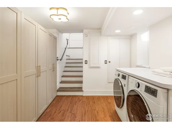 a view of a kitchen with washer and dryer
