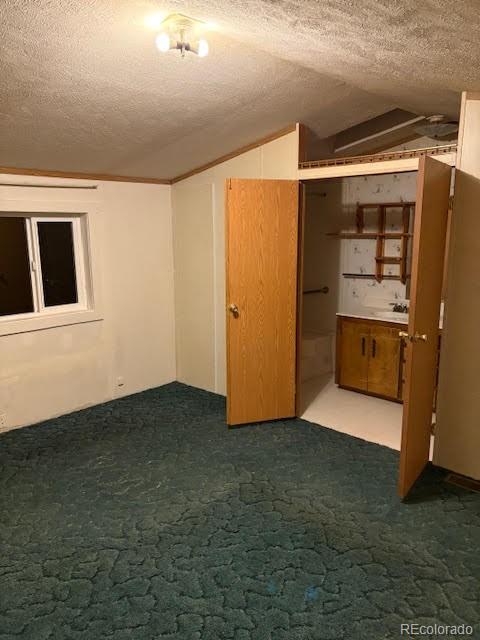 59505 County Rd Gg Moffat, CO 81143 - Photo 17 of 32 a view of an empty room with closet and windows