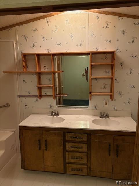 59505 County Rd Gg Moffat, CO 81143 - Photo 19 of 32 a bathroom with a sink and a mirror