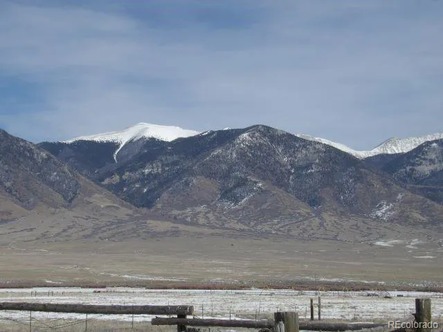 a view of lake with mountain in the background