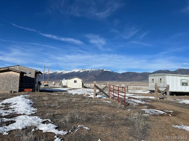 59505 County Rd Gg Moffat, CO 81143 - Photo 4 of 32 a view of residential houses with yard and mountain view in back