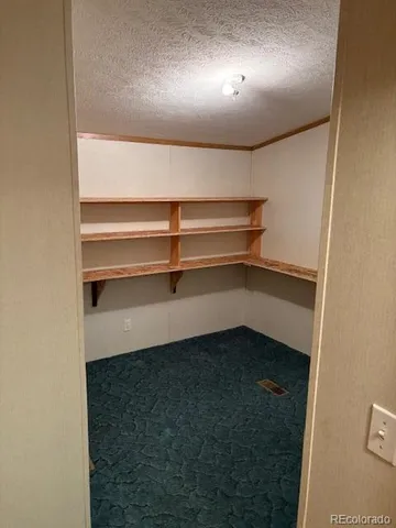 a view of small space with wooden floor