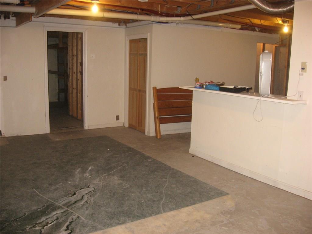 31 Malcolm Road Bridgton, ME 04009 - Photo 27 of 31 The basement has several rooms that...