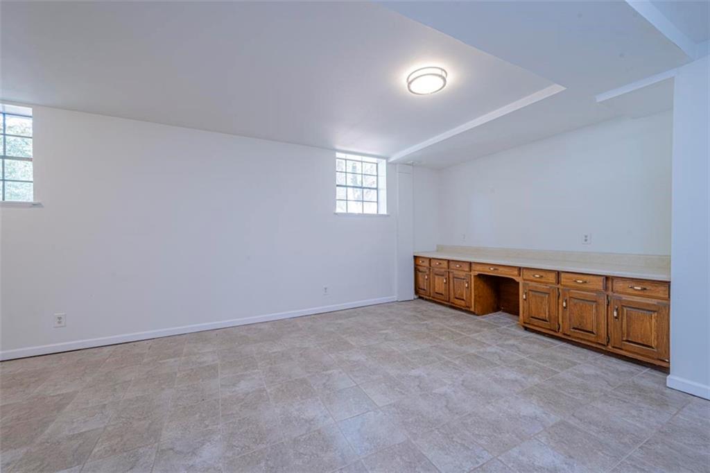 1752 Mitzi Court Duluth, GA 30097 - Photo 8 of 20 an empty room with windows