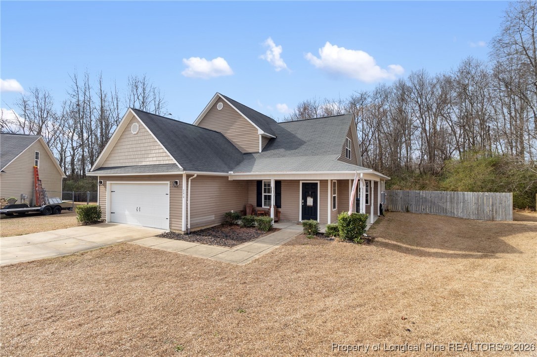 290 Mayor Court Raeford, NC 28376 - Photo 1 of 32 a front view of a house with yard and trees