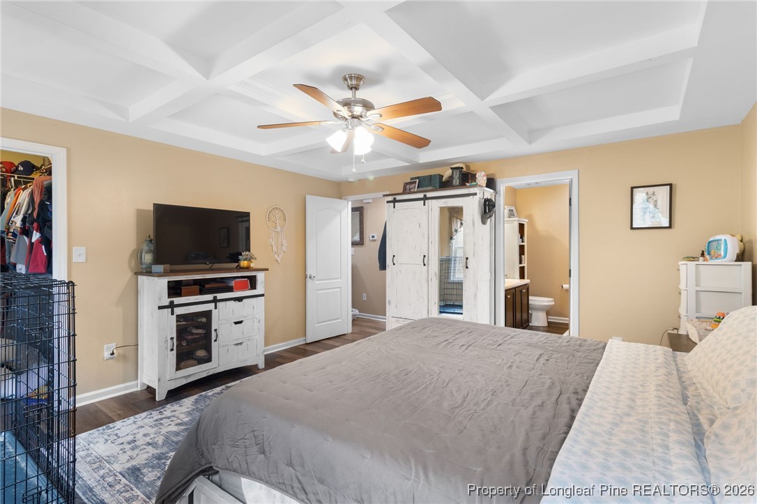 290 Mayor Court Raeford, NC 28376 - Photo 15 of 32 a bedroom with a bed and a flat screen tv