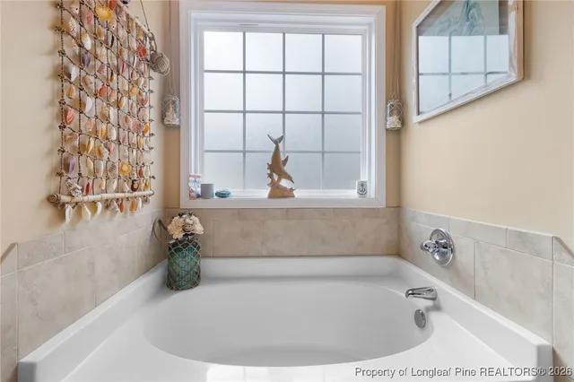 a bathroom with a bathtub