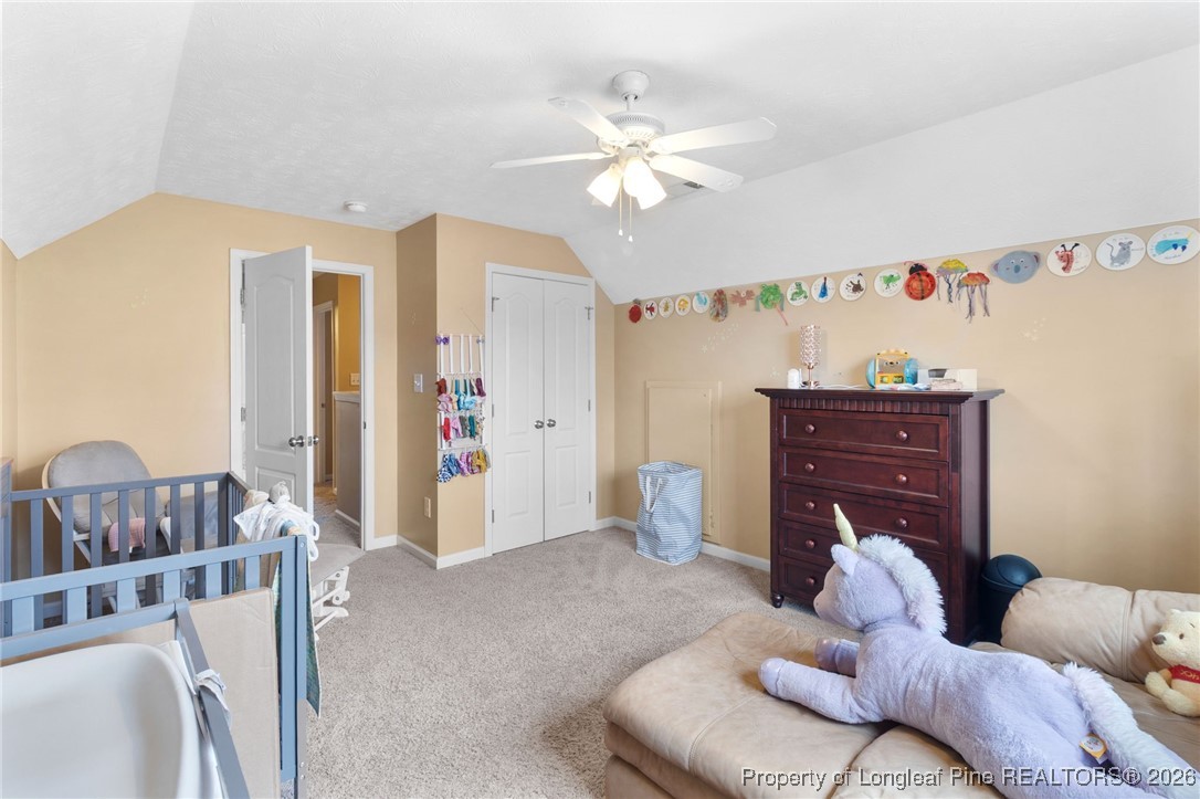 290 Mayor Court Raeford, NC 28376 - Photo 21 of 32 a living room with furniture and a chandelier