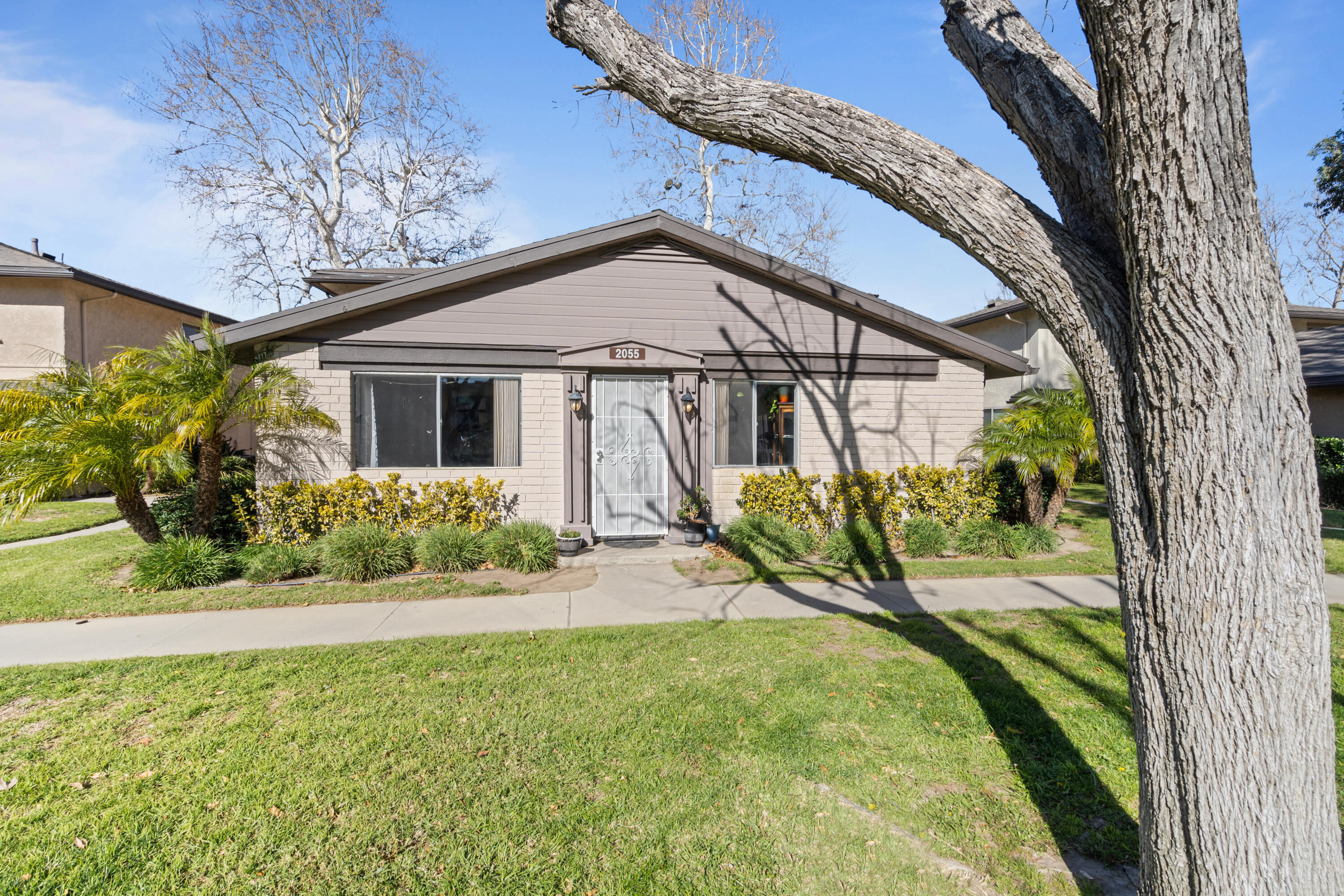 2055 Avenida Placida, Unit 1 Simi Valley, CA 93063 - Photo 23 of 39 a view of a house with a yard