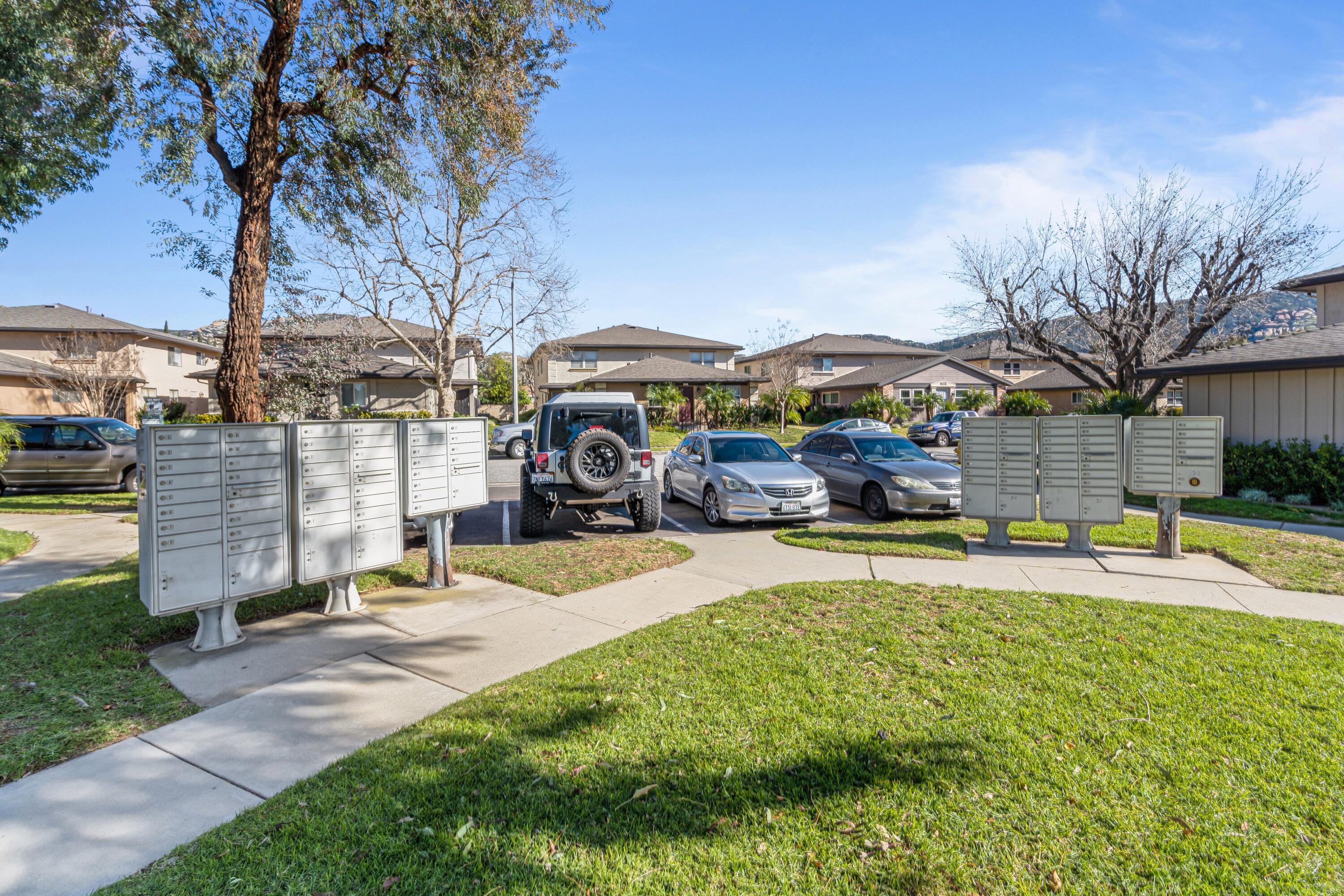 2055 Avenida Placida, Unit 1 Simi Valley, CA 93063 - Photo 28 of 39 a view of a house with a yard and sitting area