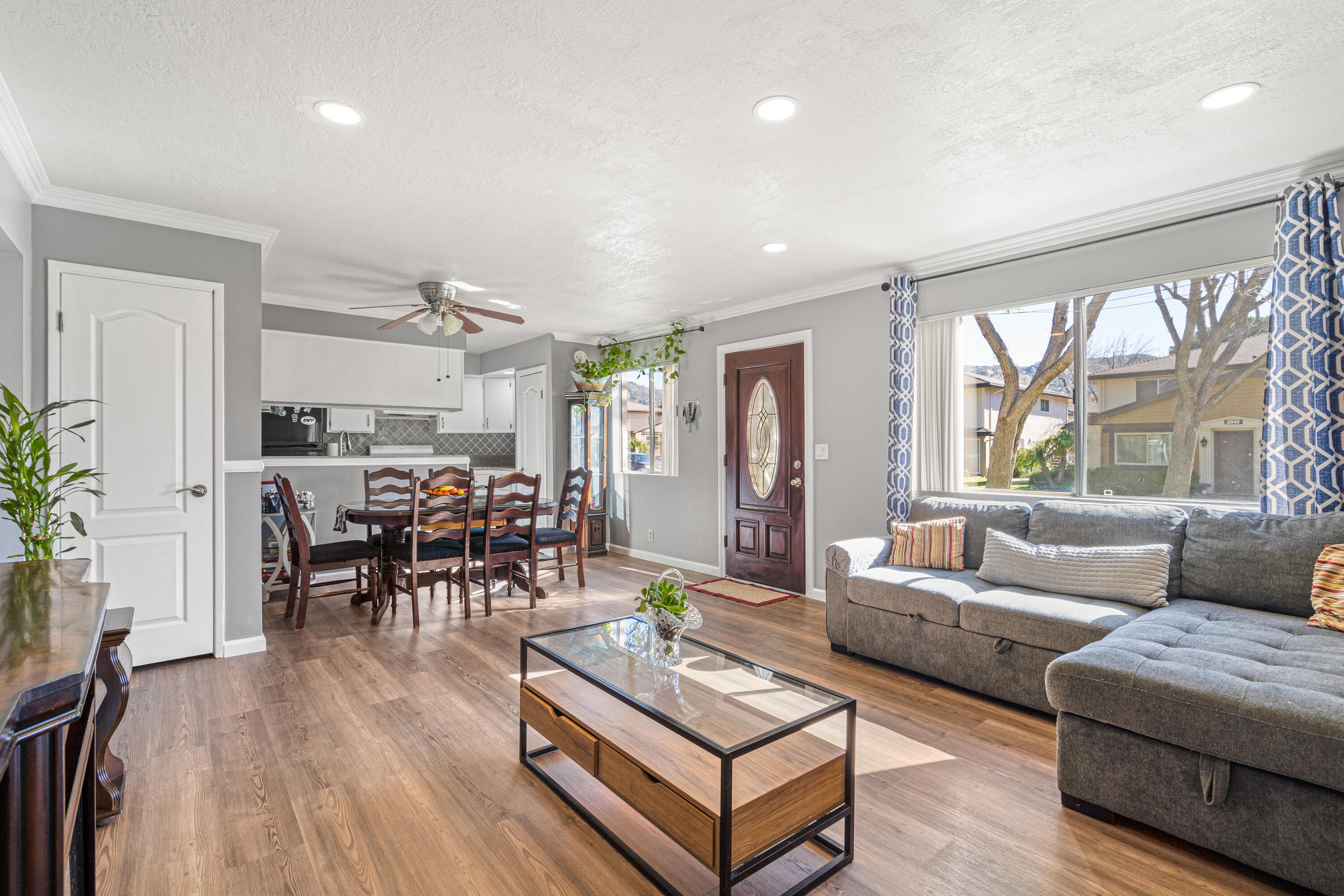 2055 Avenida Placida, Unit 1 Simi Valley, CA 93063 - Photo 3 of 39 a living room with furniture and a large window