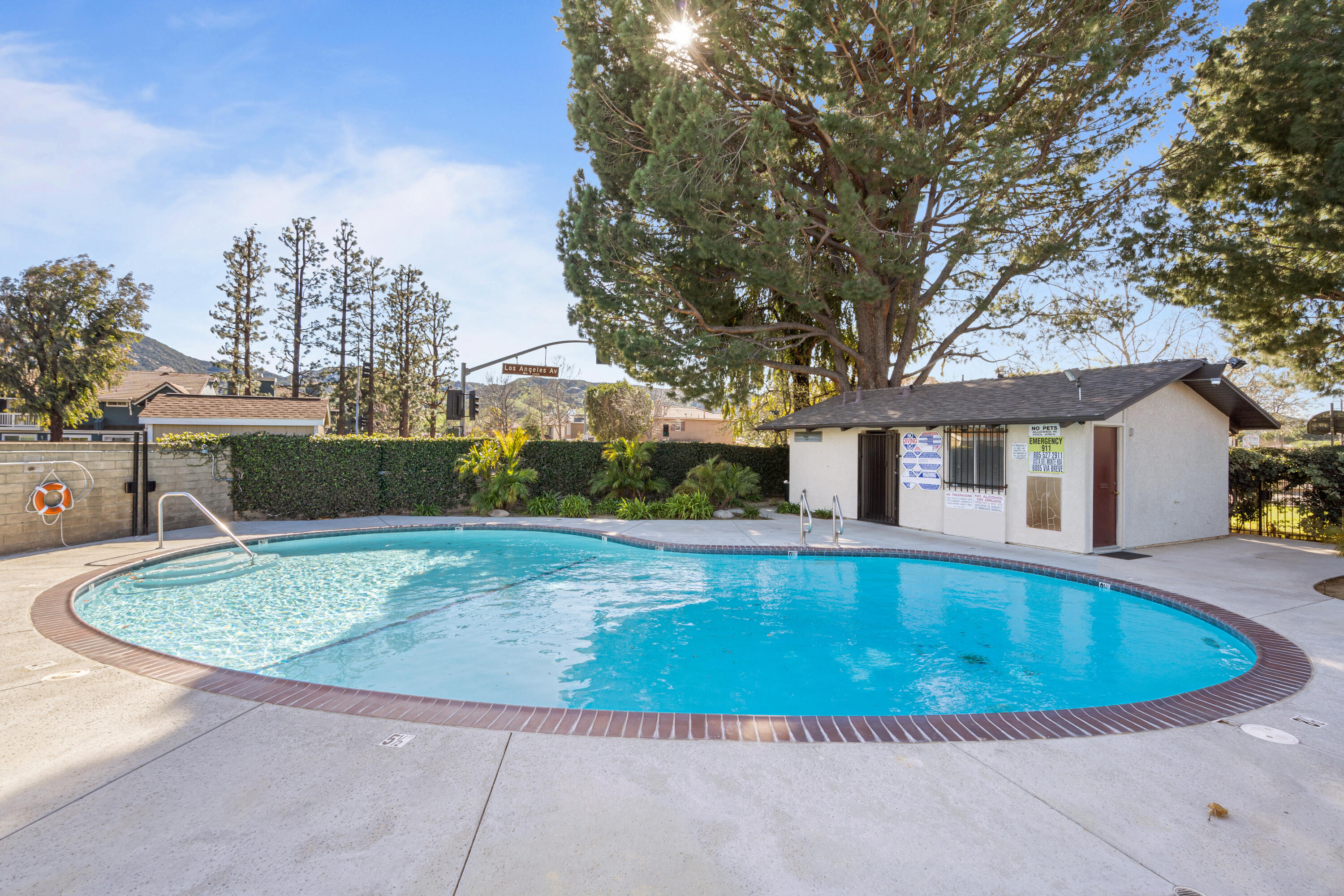 2055 Avenida Placida, Unit 1 Simi Valley, CA 93063 - Photo 31 of 39 a view of backyard with swimming pool