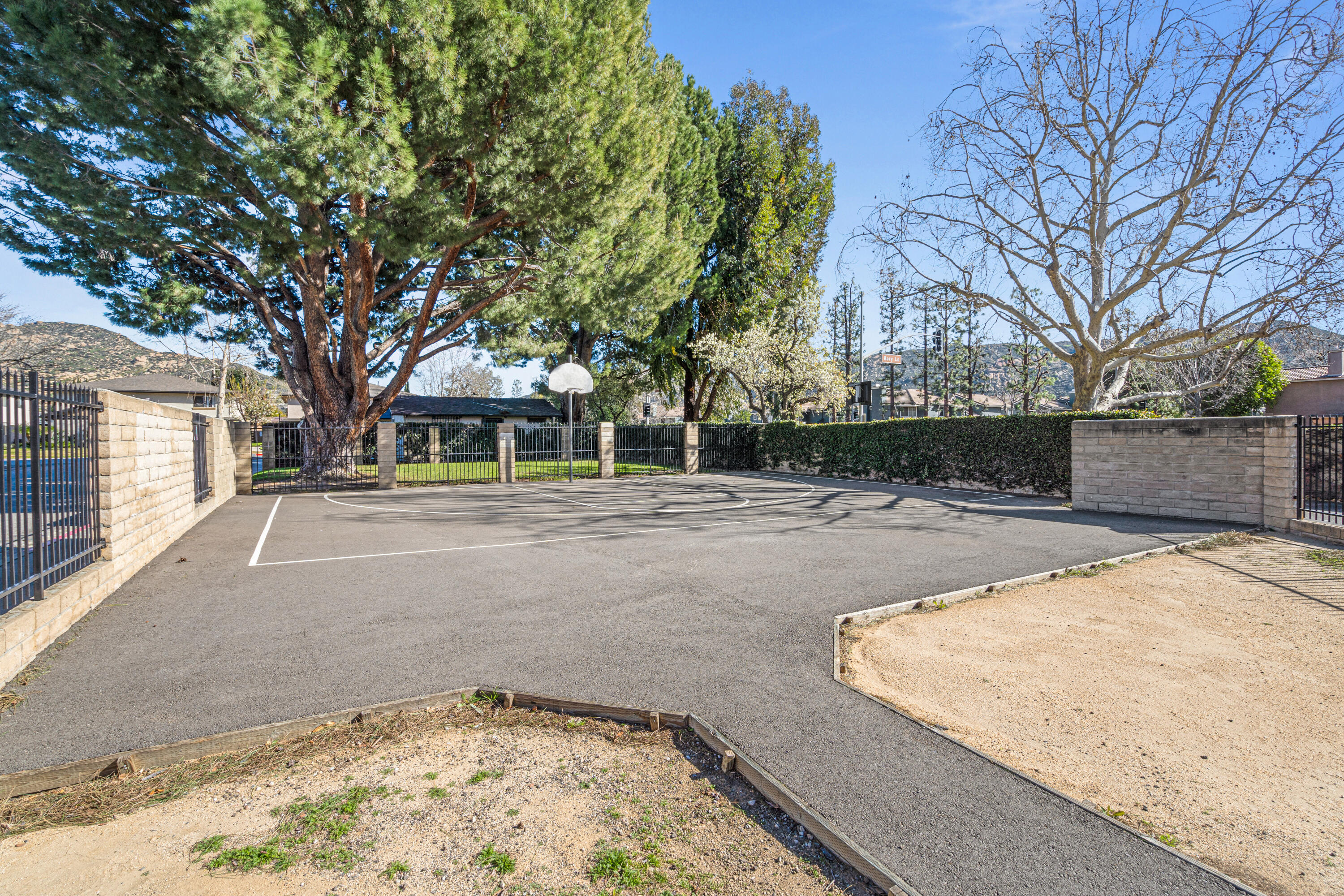 2055 Avenida Placida, Unit 1 Simi Valley, CA 93063 - Photo 32 of 39 a view of a backyard with large trees