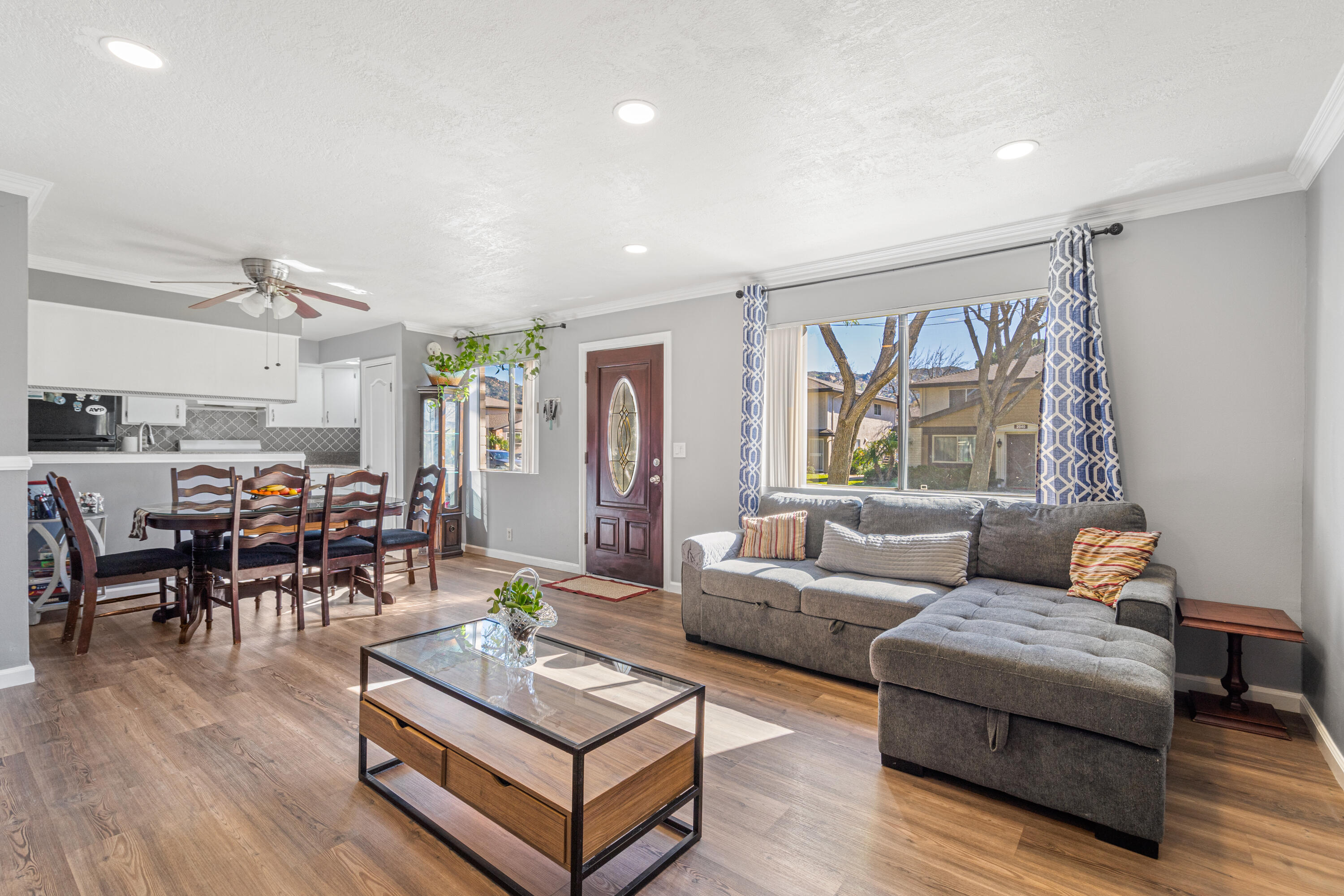 2055 Avenida Placida, Unit 1 Simi Valley, CA 93063 - Photo 6 of 39 a living room with furniture and a large window