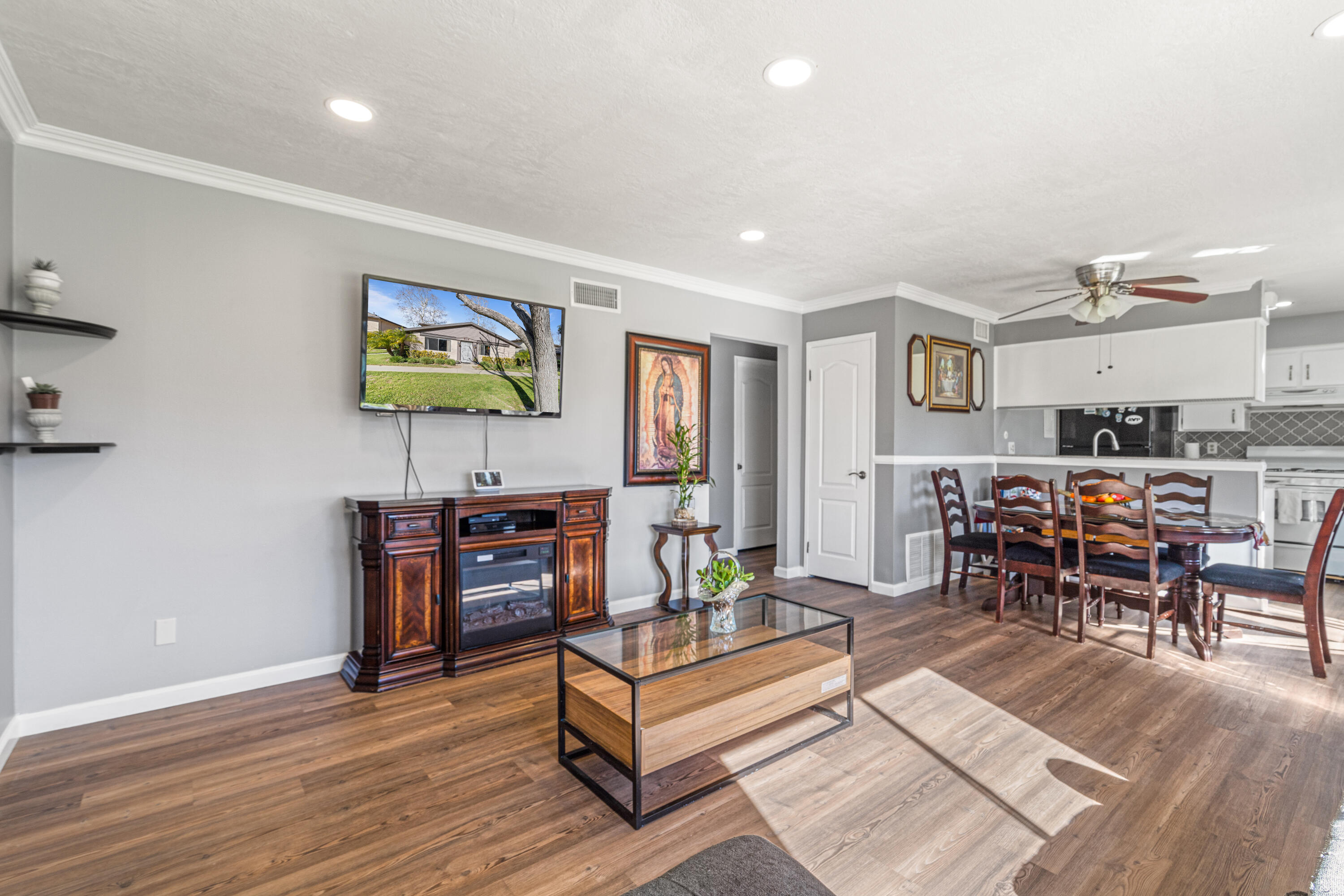 2055 Avenida Placida, Unit 1 Simi Valley, CA 93063 - Photo 7 of 39 a living room with furniture and a flat screen tv