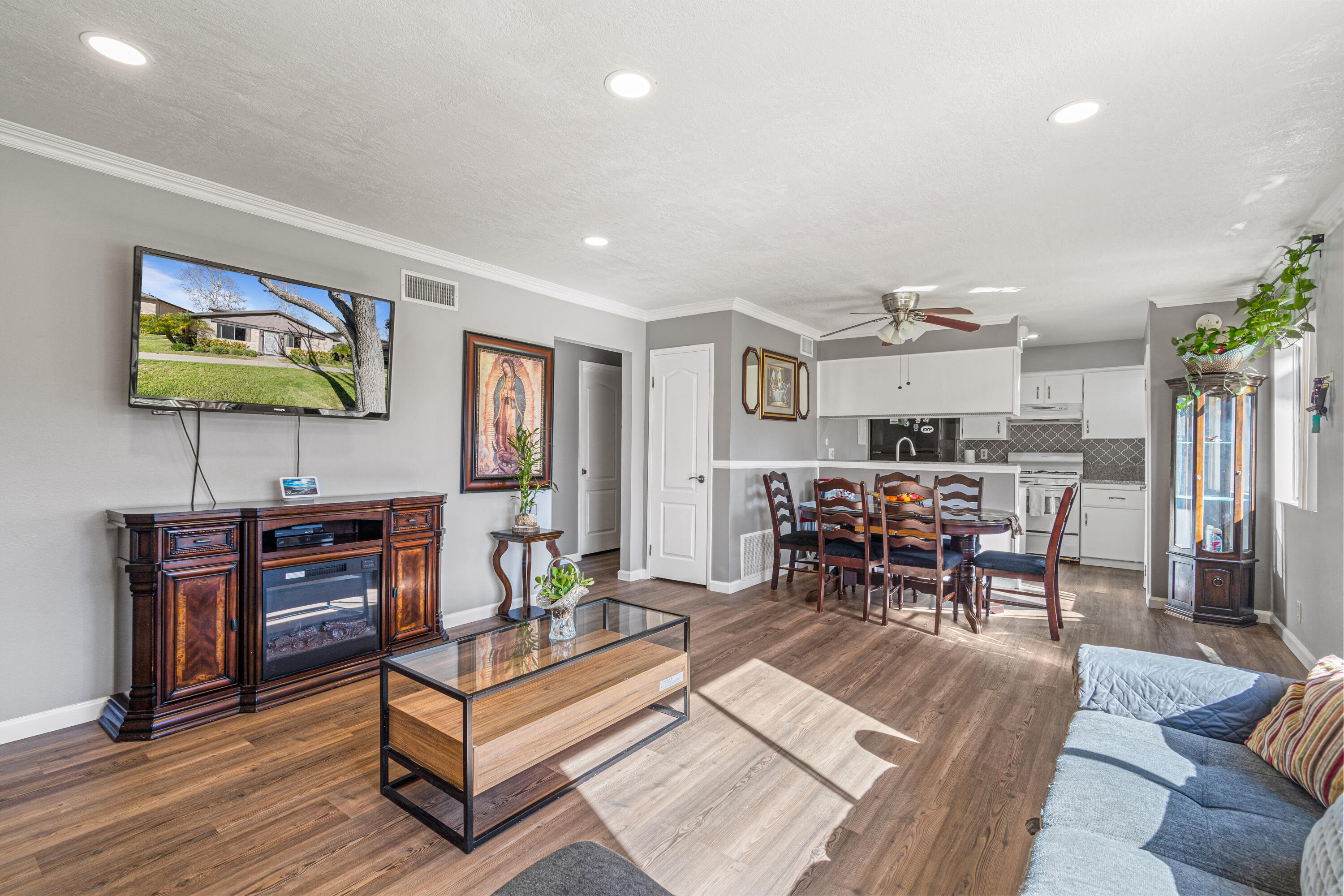 2055 Avenida Placida, Unit 1 Simi Valley, CA 93063 - Photo 8 of 39 a living room with furniture and wooden floor