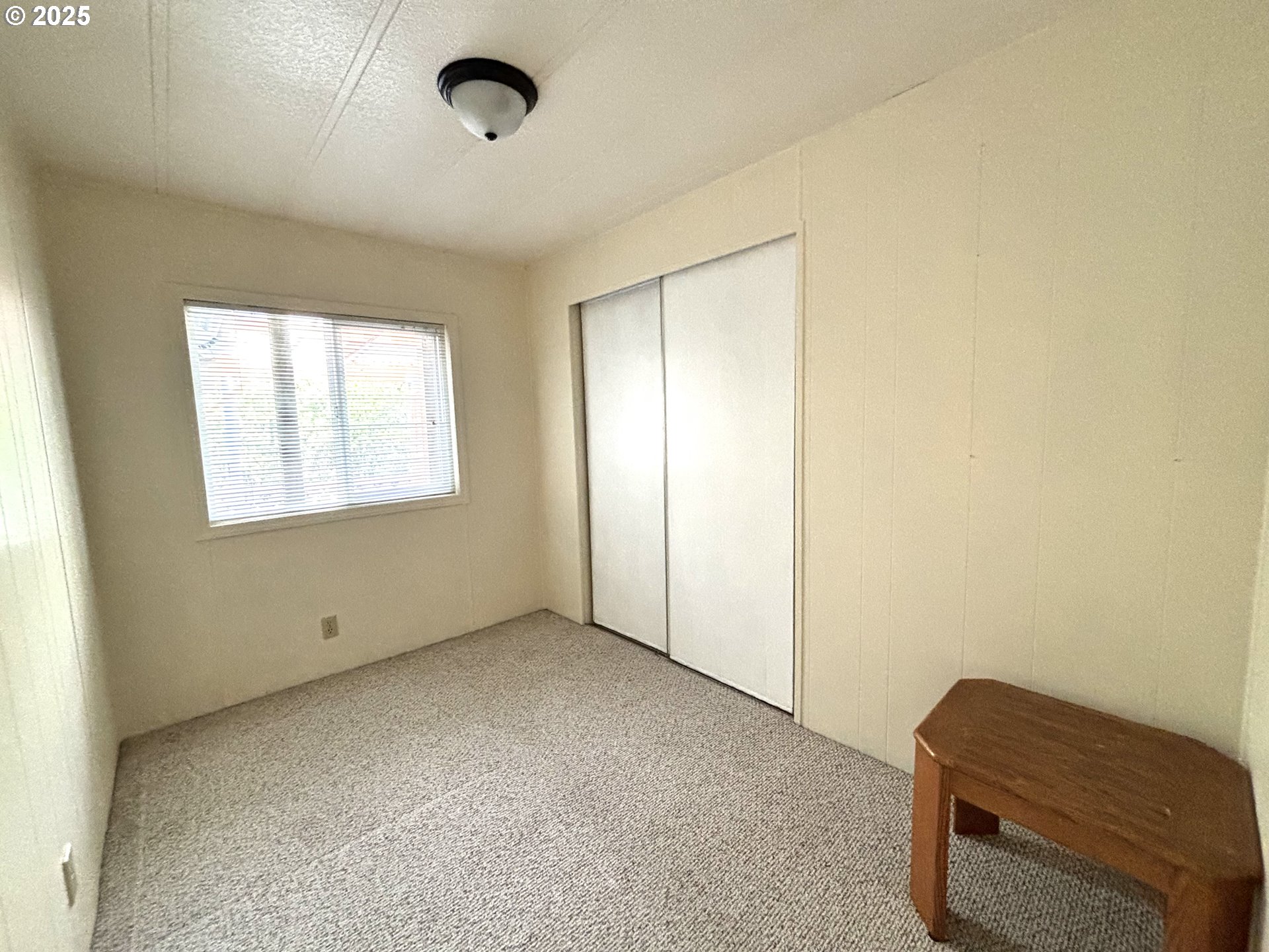 1600 Rhododendron Drive, Unit 29 Florence, OR 97439 - Photo 21 of 35 a view of room with window and a ceiling fan