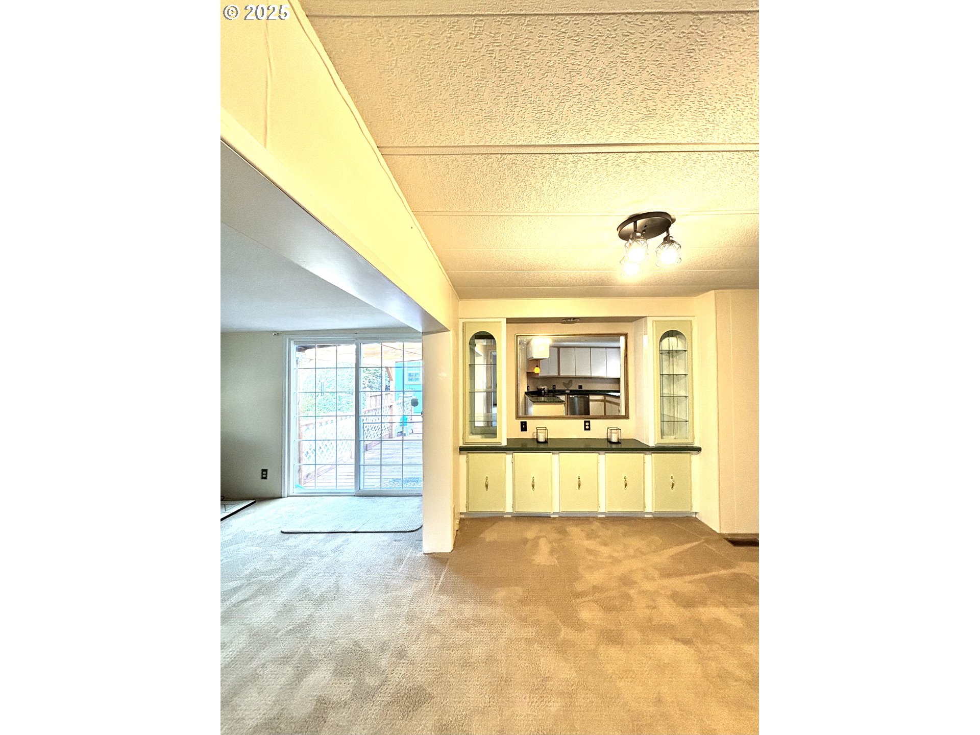 1600 Rhododendron Drive, Unit 29 Florence, OR 97439 - Photo 9 of 35 a view of an empty room with a window