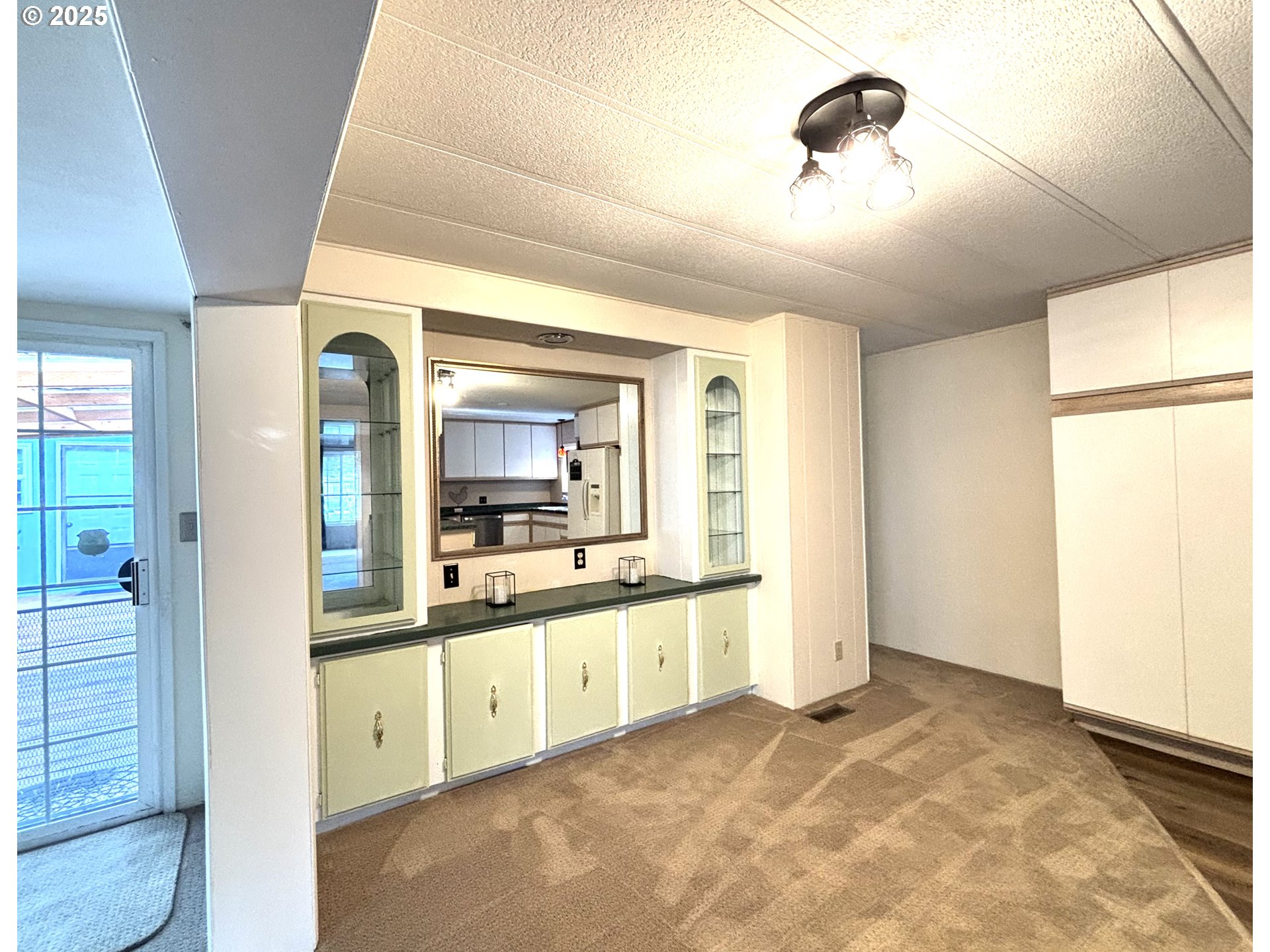 1600 Rhododendron Drive, Unit 29 Florence, OR 97439 - Photo 10 of 35 a bathroom with a sink a large mirror and a shower