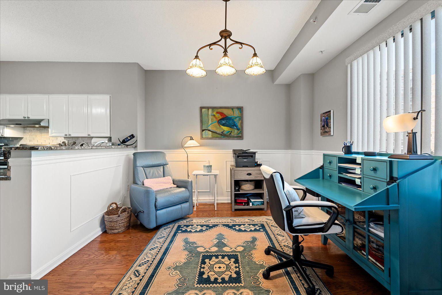 19375 Cypress Ridge Terrace, Unit 207 Leesburg, VA 20176 - Photo 12 of 44 a workspace with furniture and window