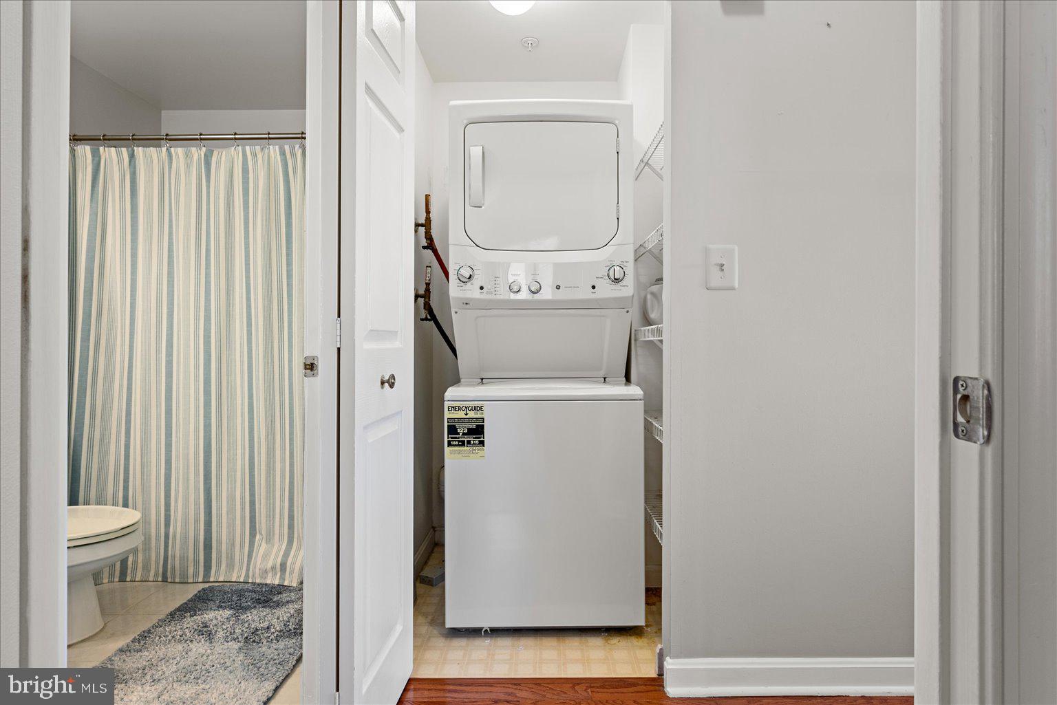 19375 Cypress Ridge Terrace, Unit 207 Leesburg, VA 20176 - Photo 23 of 44 a room with a washer and dryer