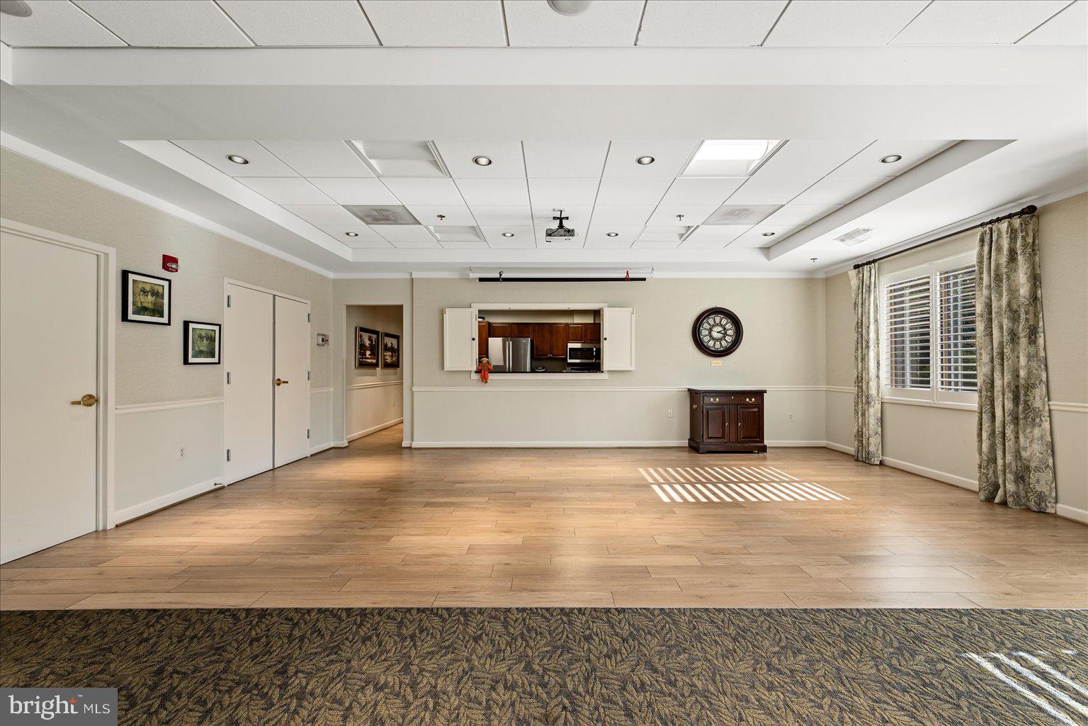 19375 Cypress Ridge Terrace, Unit 207 Leesburg, VA 20176 - Photo 25 of 44 a view of a livingroom with a fireplace