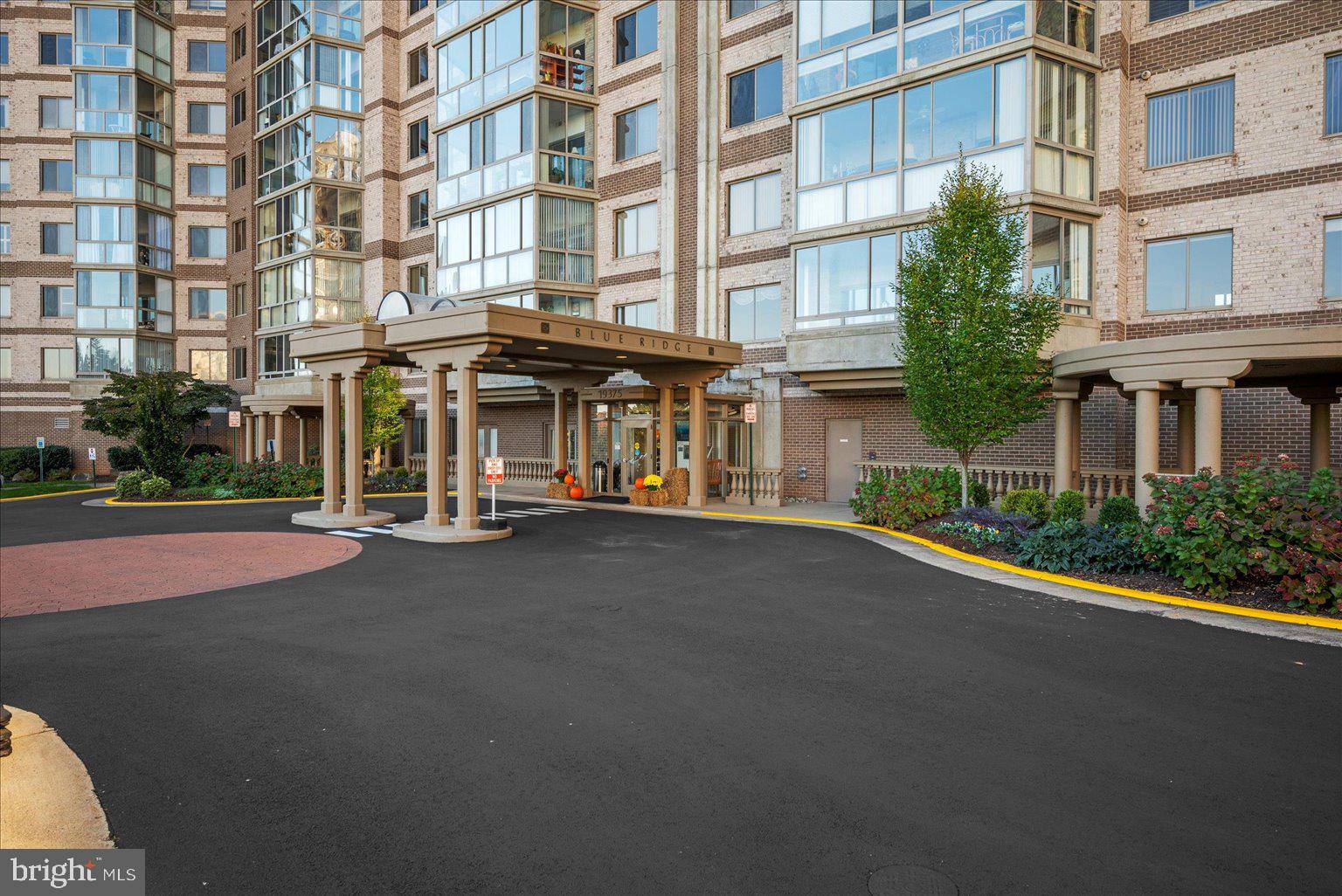 19375 Cypress Ridge Terrace, Unit 207 Leesburg, VA 20176 - Photo 30 of 44 a view of a building with a street
